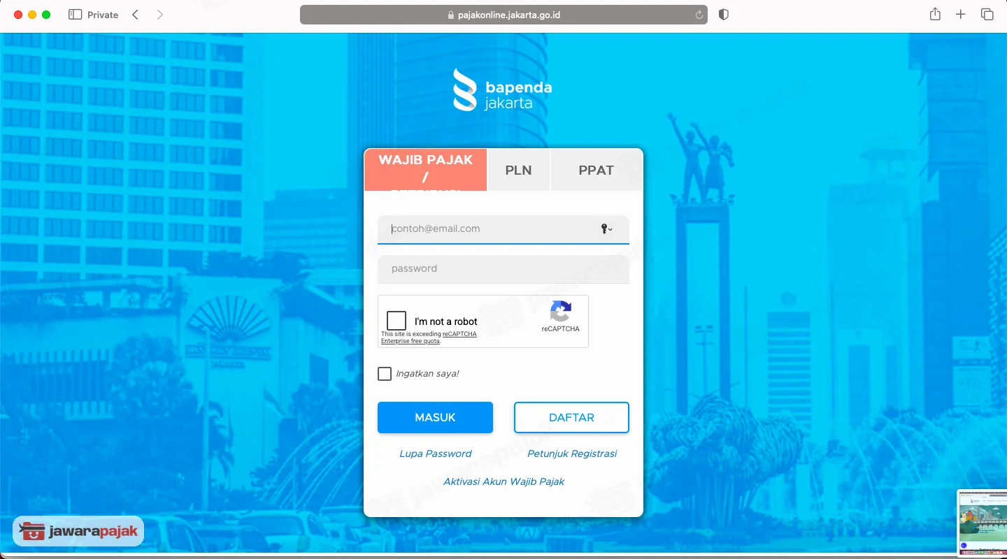 Halaman masuk dengan tab WAJIB PAJAK, kolom email dan password, dan tombol MASUK